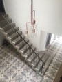 Lovely polished stair with metal balustrade