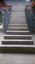Varying width curved concrete stairs, 3 metres from floor to floor