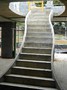 Curved staircase with closed string on both sides