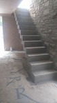 Treads and risers of stair, polished, finished concrete