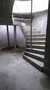 Concrete spiral stair with half landing