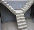 A 1m wide T-shaped concrete stairs