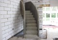 A helical stairs with concrete balustrade