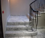 A concrete stairs finished with marble
