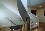 Helical concrete stairs with concrete balusrade
