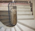 A helical concrete stairs in a residential property