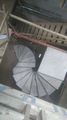 S-shaped concrete stairs with square landing